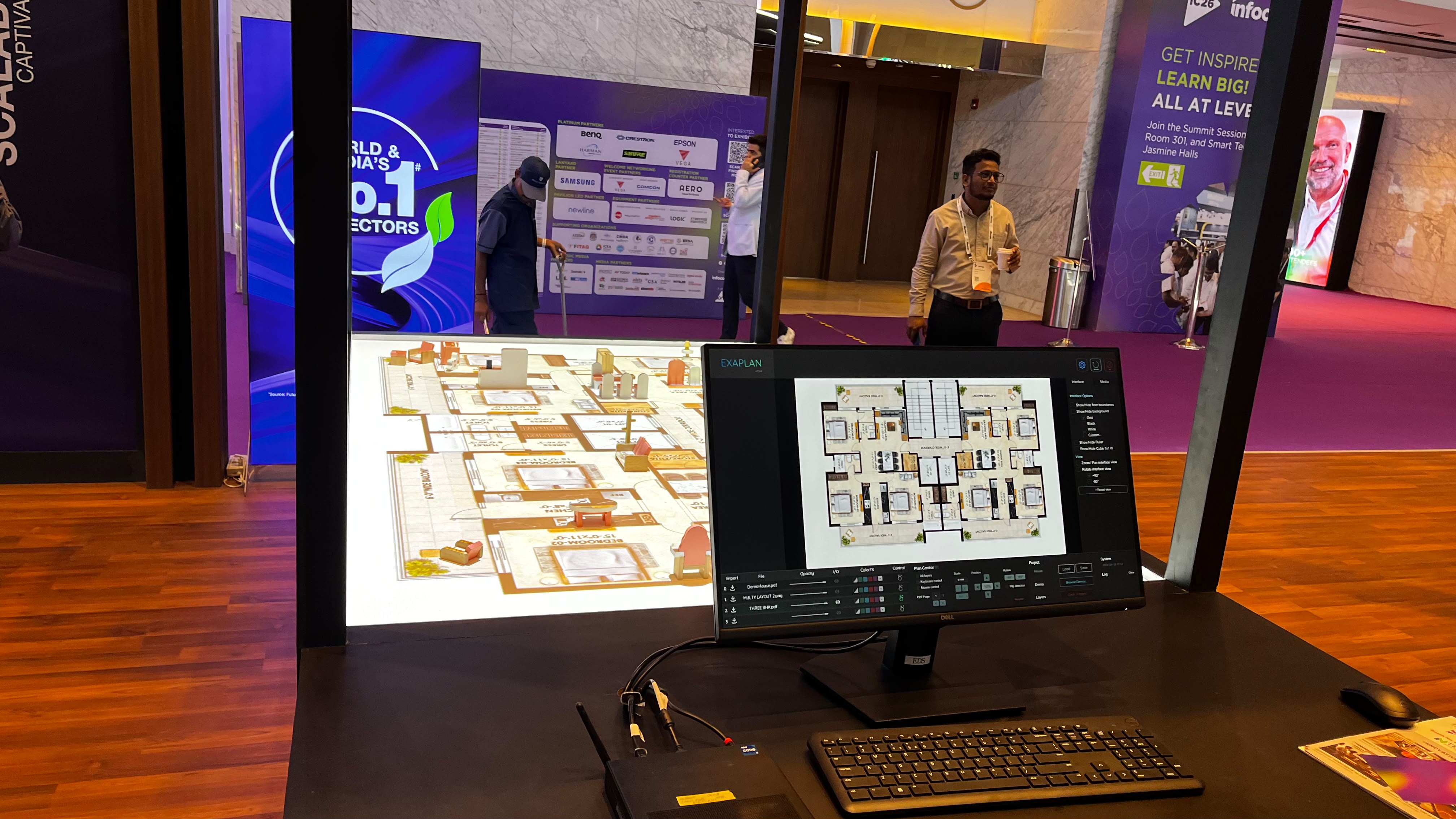 EXAPLAN interface on a monitor beside a projected tabletop floor plan